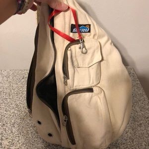 MERU Brand Kidney Shape Sling back purse.